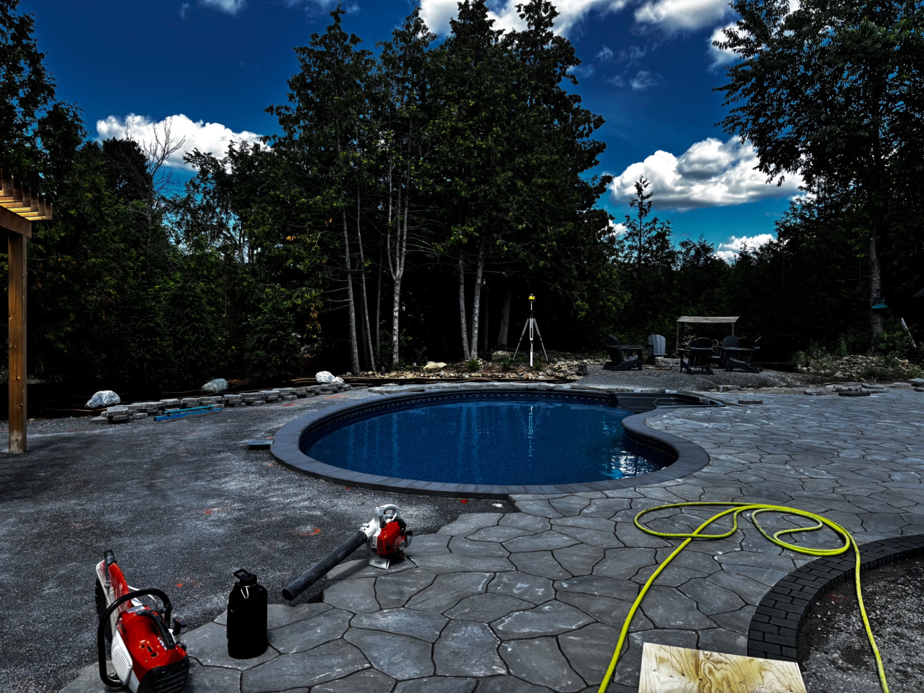 Flagstone patio being set around a new pool